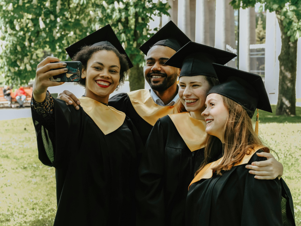 A group of Canadian graduates, excited for the next stage of their life: earning money. Find out if you need a university degree to be well-off in Canada.